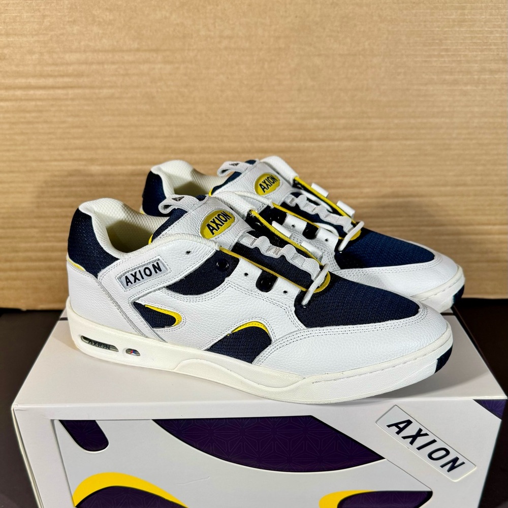 Axion Genesis 
White/Navy/Yellow #1770 of 1998
Size 11.5
New in box
